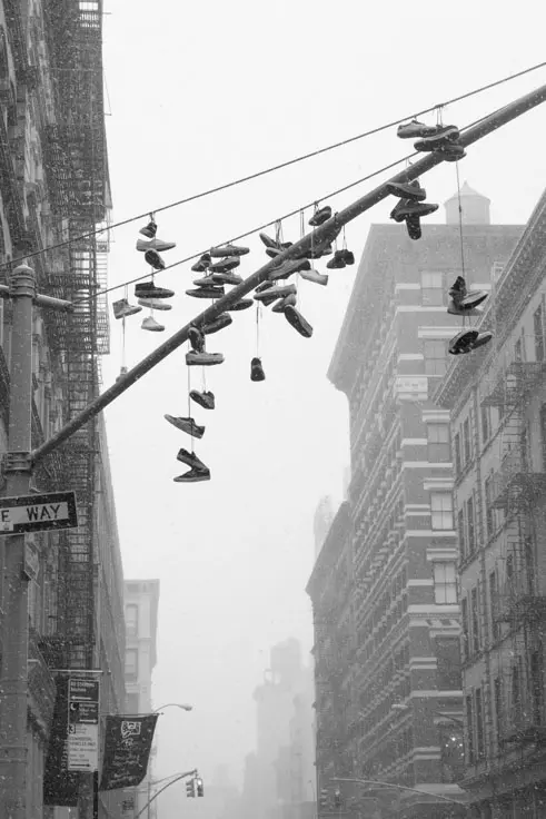 Sneakers on a lampost in SoHo in winter during a New York Photo Tour