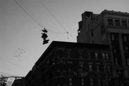 Sneakers, Birds, Plane & Tenement Building, Lower East Side, 2021